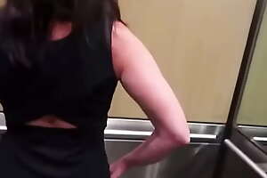 MILF Coils Over For Me on touching Elevator
