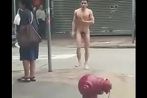 Naked Asian panhandler public