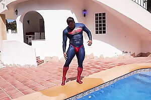 Superman gets his thonged spandex oblige soaking wet