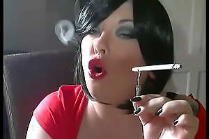 BBW Mistress Tina Snua Smokes A Cigarette In A Holder