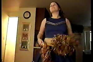 Busty Brunette Cheerleader tricked into sucking guy's bushwa and stroking him off.
