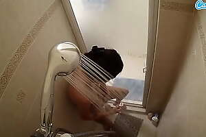 petite teen shaving pussy on spy shower cam