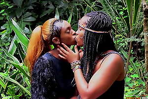 Ebony party queens outdoor lesbian makeout in African music festival