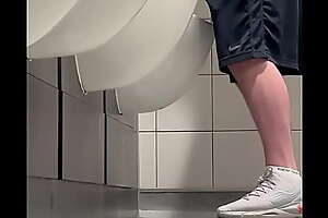 Piss at urinal manchester