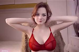 redhair girl play tits in a sheer red bra
