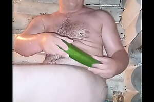 A Russian guy fucked his fat ass with a cucumber! And even jerked off at the same time.His friends filmed it on a hidden camera.That's how they found out he was gay)))))