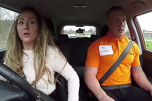 Long-haired MILF blows her car driving cram