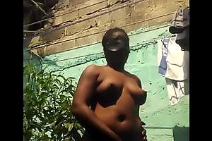 Jamaican woman bare-ass in my garden