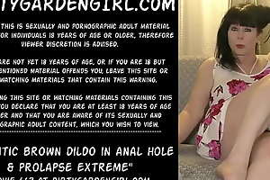 Grand brown dildo in anal hole coupled with  prolapse original