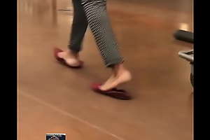 ebony soles walking in slippers