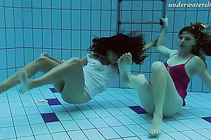 Underwater swimming come together lesbians Lera and Sima Lastova