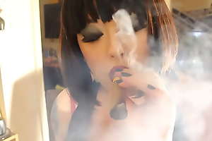 BBW Mistress Tina Snua Smokes A Cigar Uniformly Off Cleavage
