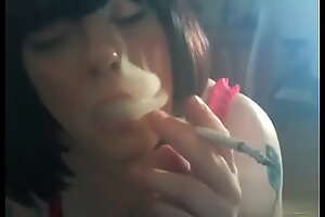 Beamy Mistress Tina Snua Smokes A 120 Cigarette Close by Lots Of Dangles